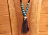 Long Wood and Magnesite Necklace with Brown Leather Tassel - Detail View