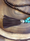 Long Wood and Magnesite Necklace with Brown Leather Tassel - Tassel View